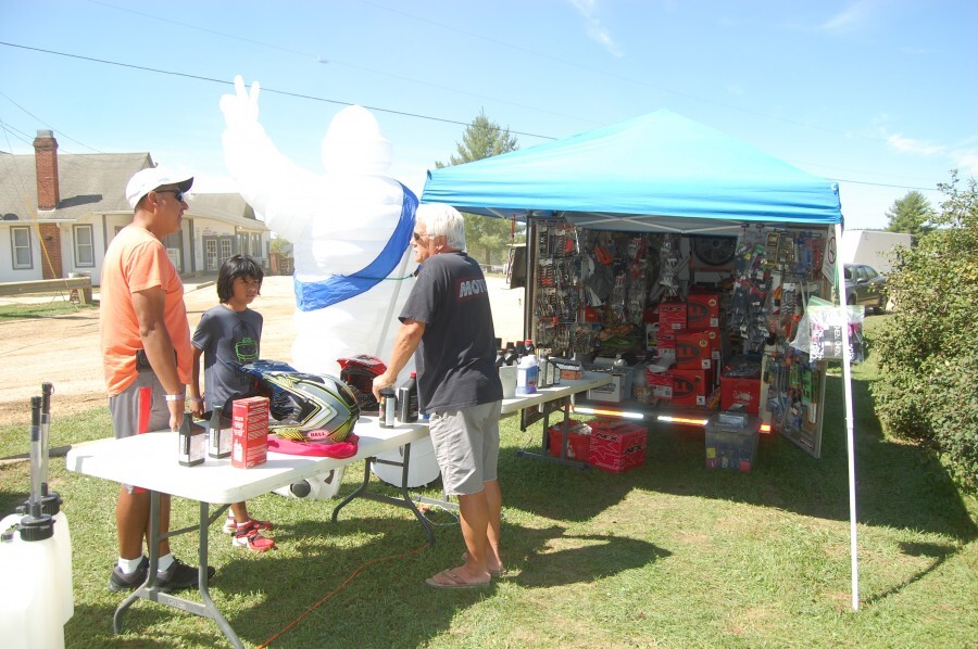 people at pop-up tent shop